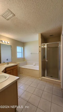 a bathroom with a sink and a bathtub