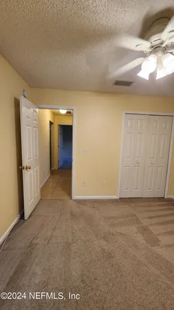 a view of empty room with a window