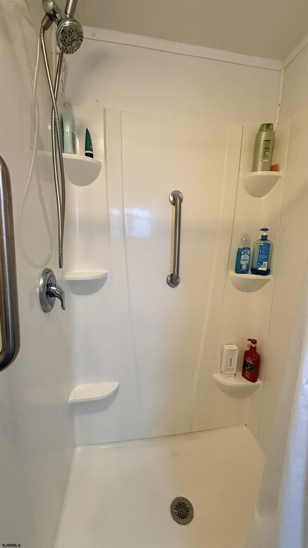 101 Country Lane Buena, NJ 08310 - Photo 21 of 25 a bathroom with a shower