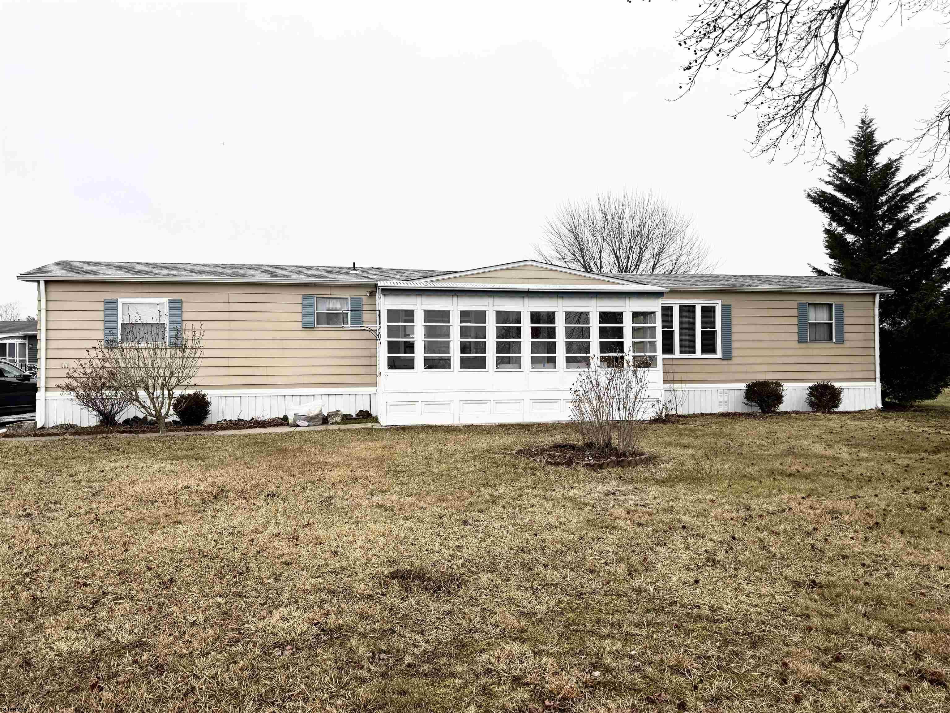 101 Country Lane Buena, NJ 08310 - Photo 3 of 25 a house view with a garden space