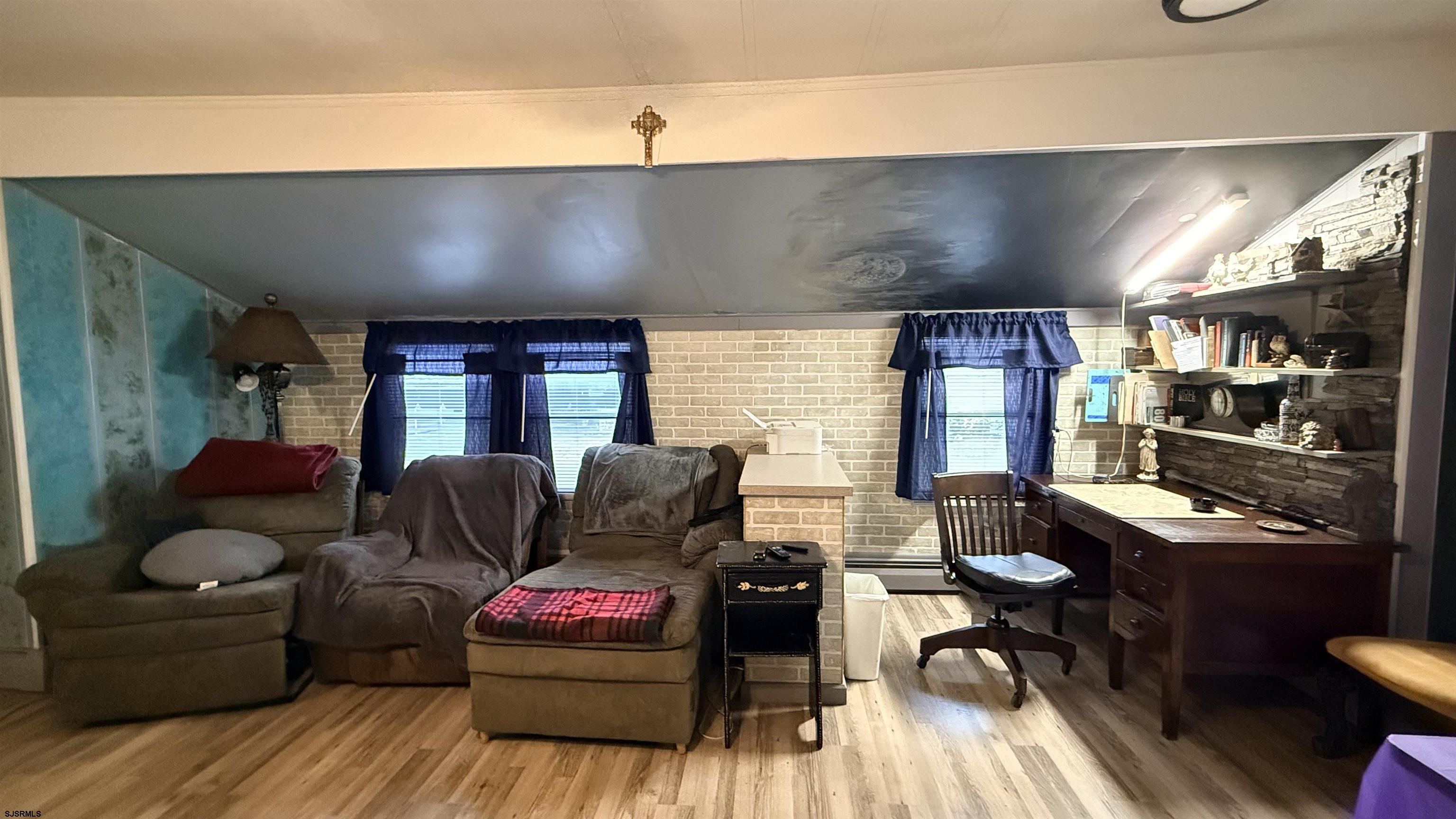101 Country Lane Buena, NJ 08310 - Photo 4 of 25 a living room with furniture and a large window