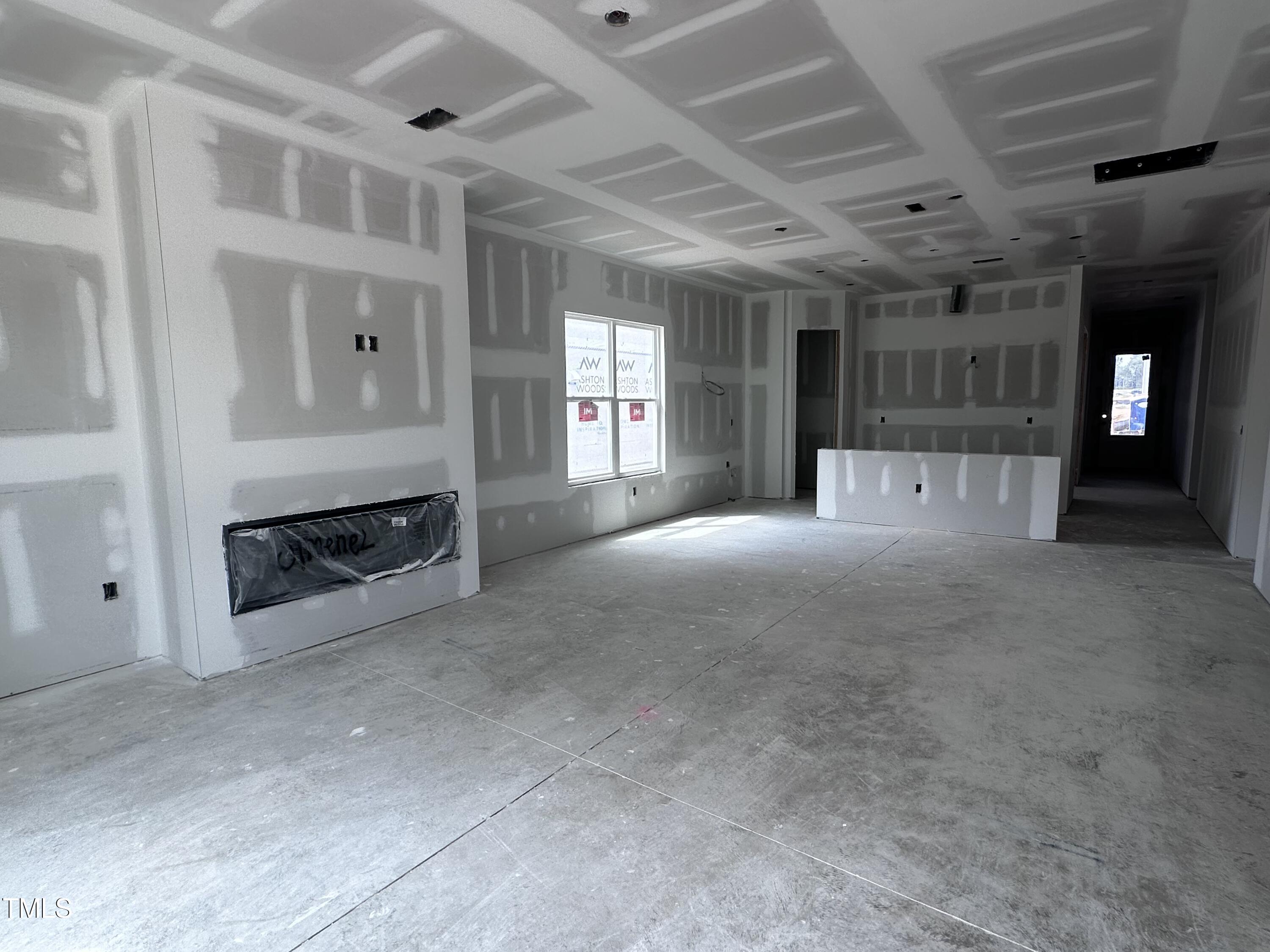 143 South Harvest Ridge Way, Unit LOT 229 Clayton, NC 27520 - Photo 13 of 32 13 - Family and Kitchen