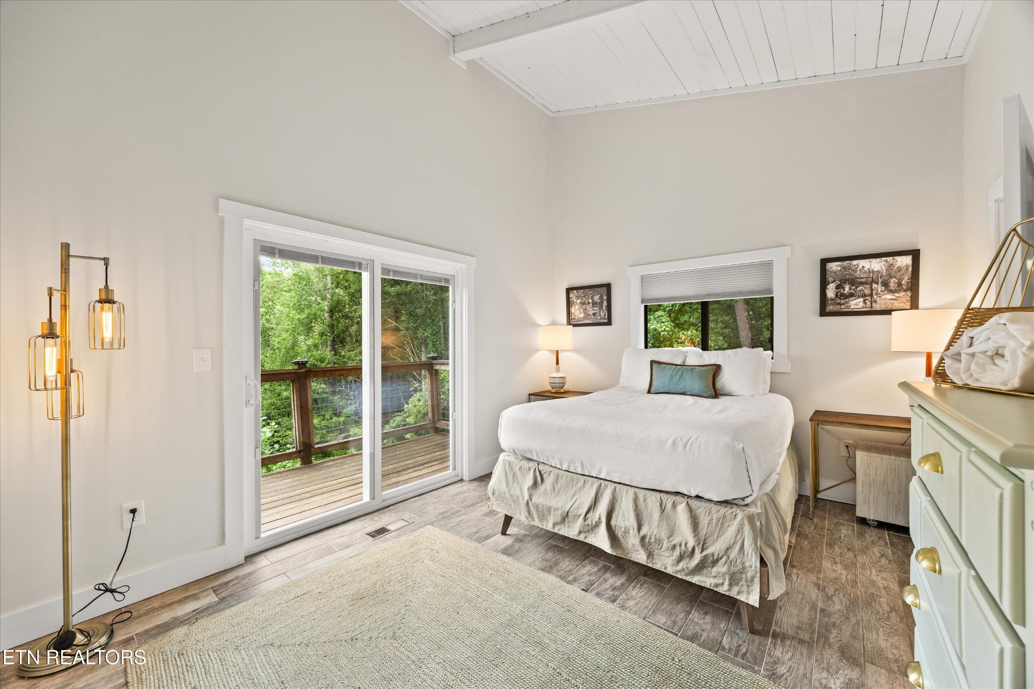123 Cutter Gap Road Townsend, TN 37882 - Photo 13 of 40 a bed room with a bed and a table