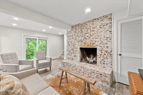 a bedroom with a large bed and a large window