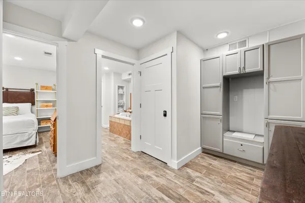 a kitchen with stainless steel appliances a refrigerator and a stove