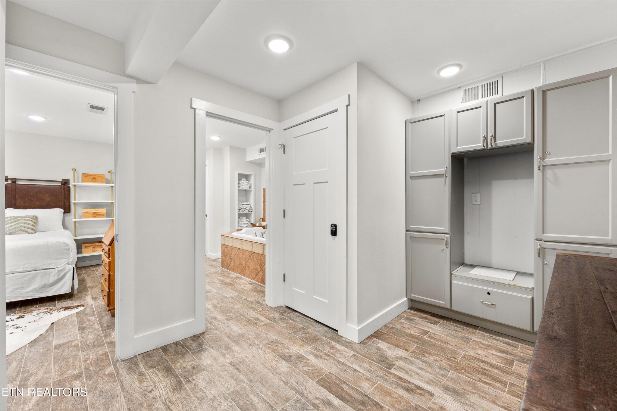 123 Cutter Gap Road Townsend, TN 37882 - Photo 20 of 40 a view of a hallway with bathroom and wooden floor