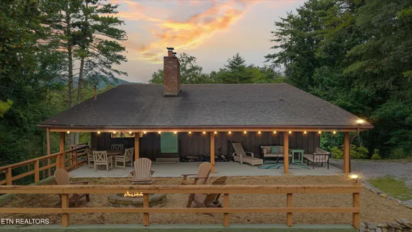 an outdoor view of the patio and swimming pool