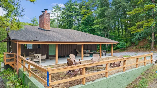 a view of a forest from a balcony