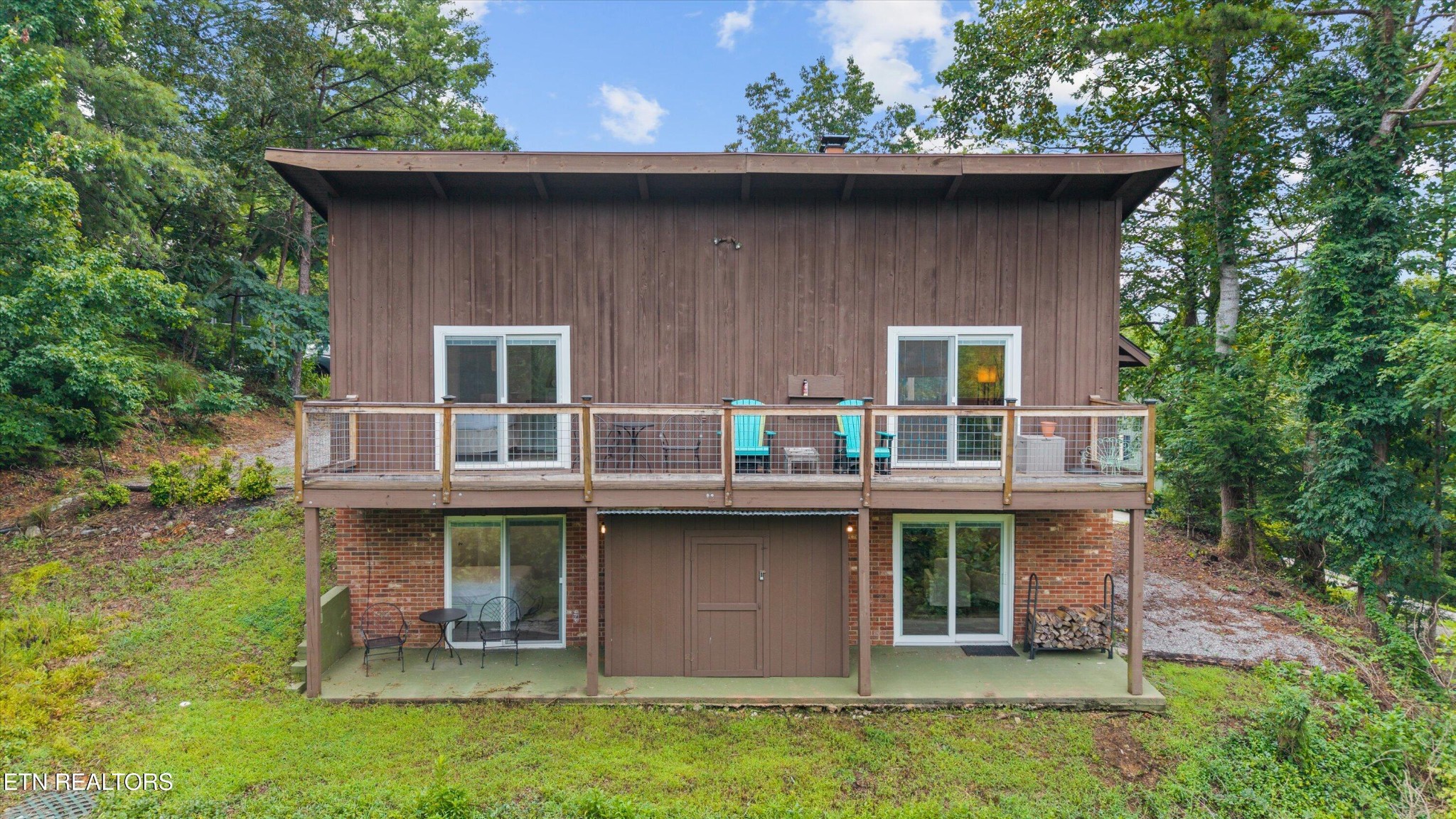 123 Cutter Gap Road Townsend, TN 37882 - Photo 34 of 40 a front view of a house with a garden