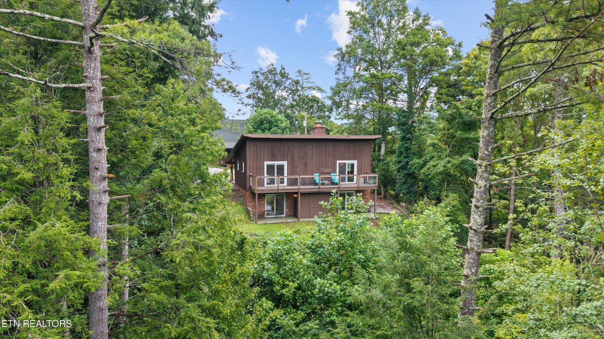 123 Cutter Gap Road Townsend, TN 37882 - Photo 37 of 40 a view of a house with a backyard