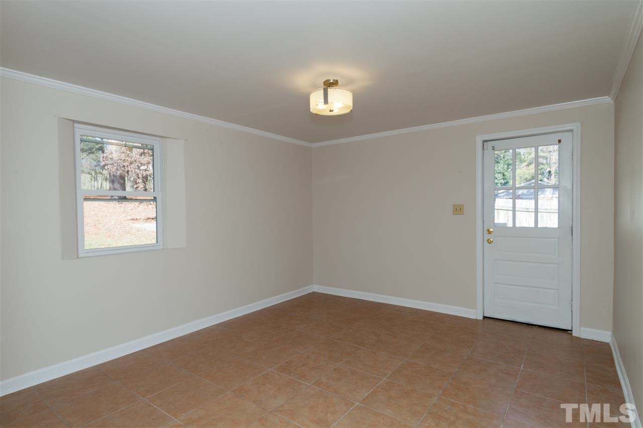 2400 Lawrence Drive Raleigh, NC 27603 - Photo 19 of 24 Office in finished basement with door to exterior. Tile floors.