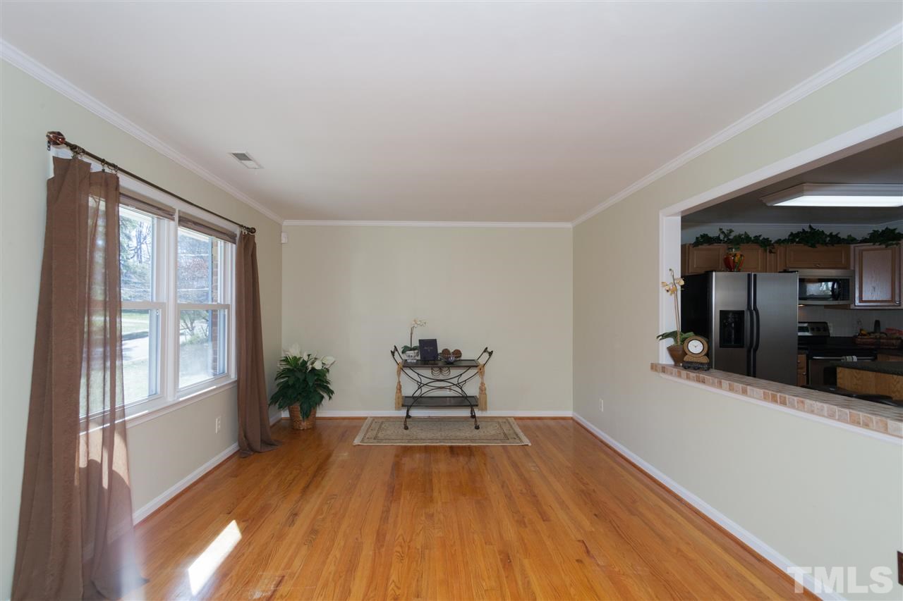 2400 Lawrence Drive Raleigh, NC 27603 - Photo 3 of 24 Oversized formal living room with hardwood floors and lots of light!