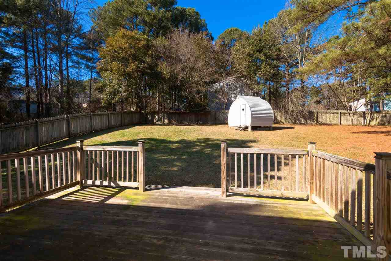 2400 Lawrence Drive Raleigh, NC 27603 - Photo 21 of 24 Large deck overlooking the .32 acre home site!