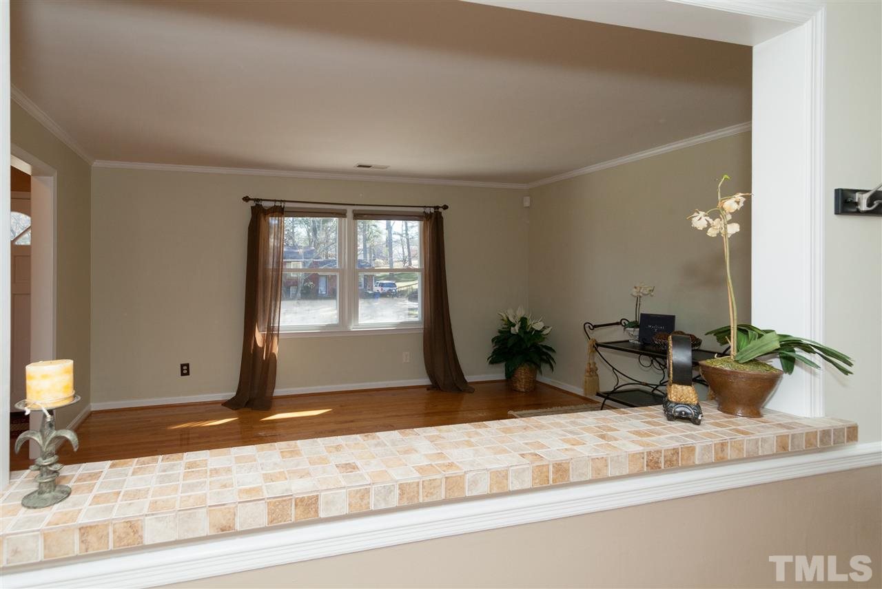 2400 Lawrence Drive Raleigh, NC 27603 - Photo 7 of 24 Kitchen is open to the living room