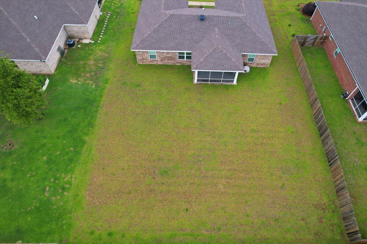 4695 Perception Circle Milton, FL 32570 - Photo 3 of 30 an aerial view of residential houses with outdoor space and trees