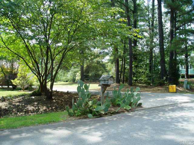12605 Kristy Circle Raleigh, NC 27613 - Photo 5 of 8 a view of a park with large trees