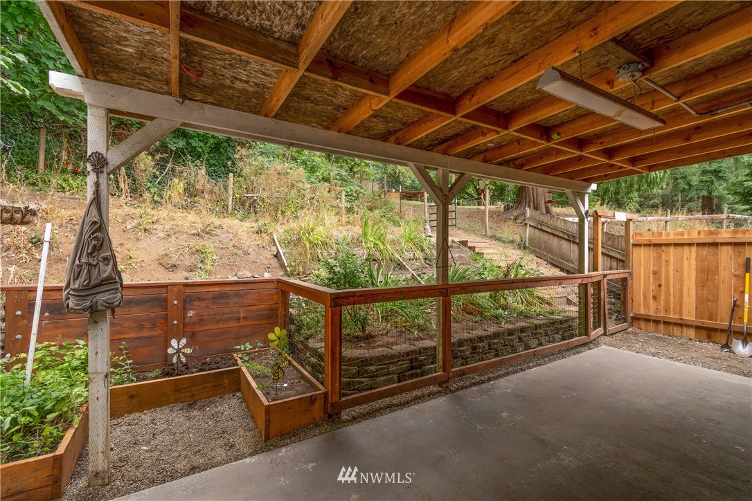732 Coal Creek Road Longview, WA 98632 - Photo 22 of 35 a view of outdoor space with wooden floor and iron fence