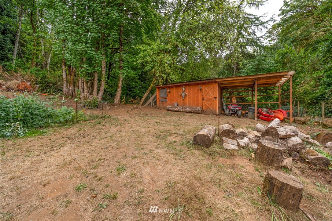 732 Coal Creek Road Longview, WA 98632 - Photo 24 of 35 a view of a backyard with a patio