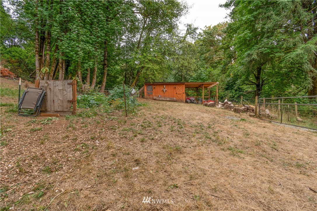 732 Coal Creek Road Longview, WA 98632 - Photo 25 of 35 a backyard of a house with lots of green space