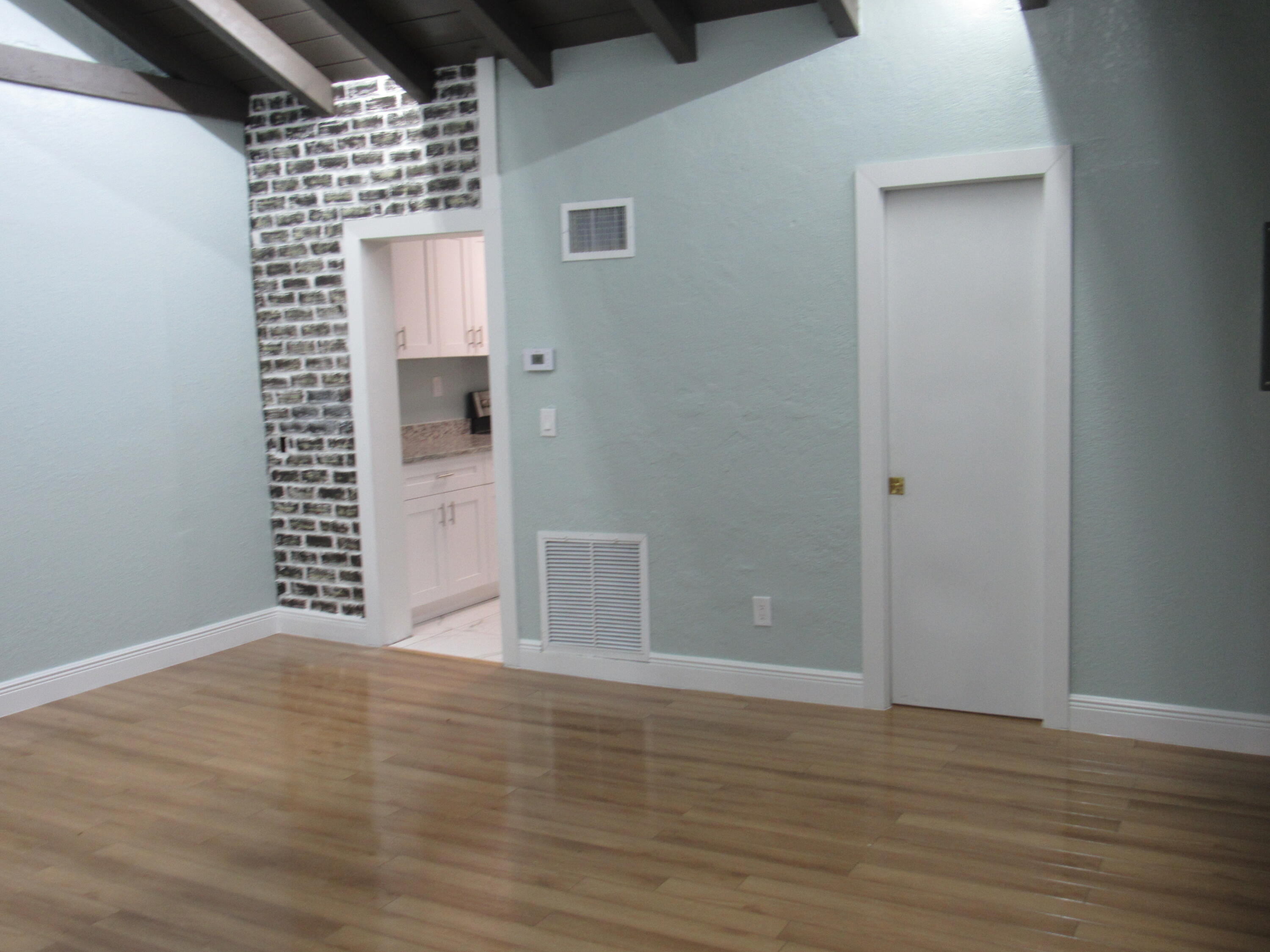 4283 Cocoanut Road, Unit 1 West Palm Beach, FL 33406 - Photo 4 of 14 Living/Dining room