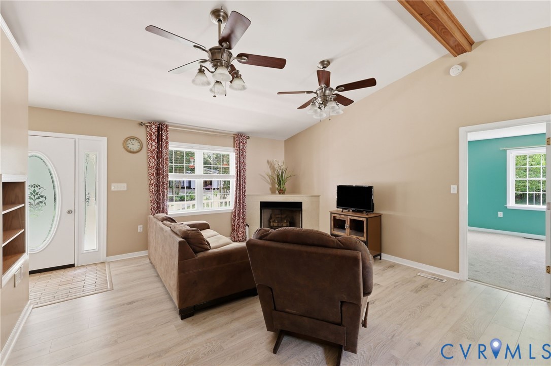1375 Gills Road Powhatan, VA 23139 - Photo 21 of 48 Living room/family room with new flooring, gas cor