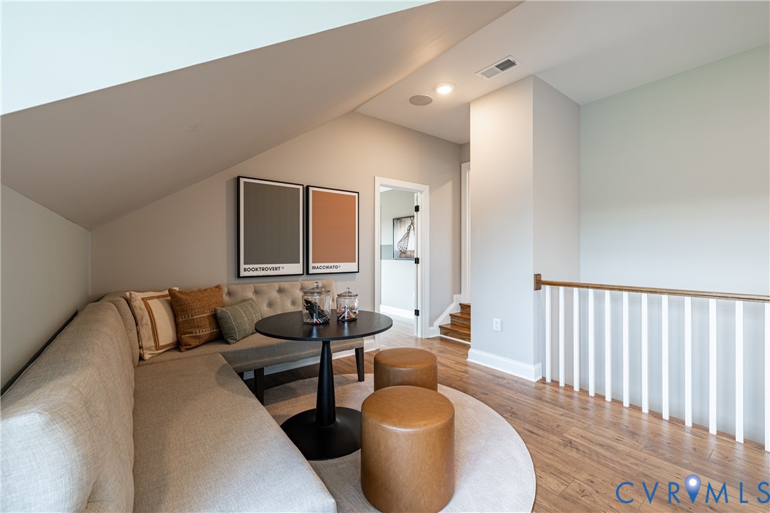 8264 Mt Eagle Road Ashland, VA 23005 - Photo 20 of 23 a living room with furniture and a wooden floor
