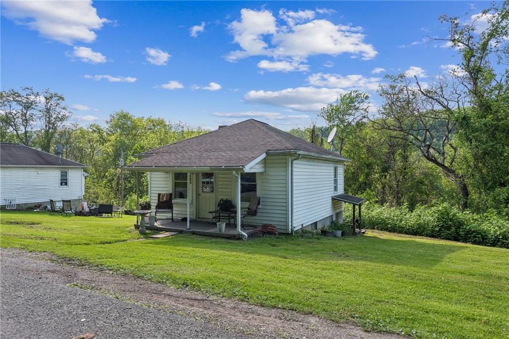 375 Reduction Road Smithton, PA 15479 - Photo 28 of 30 a front view of a house with garden