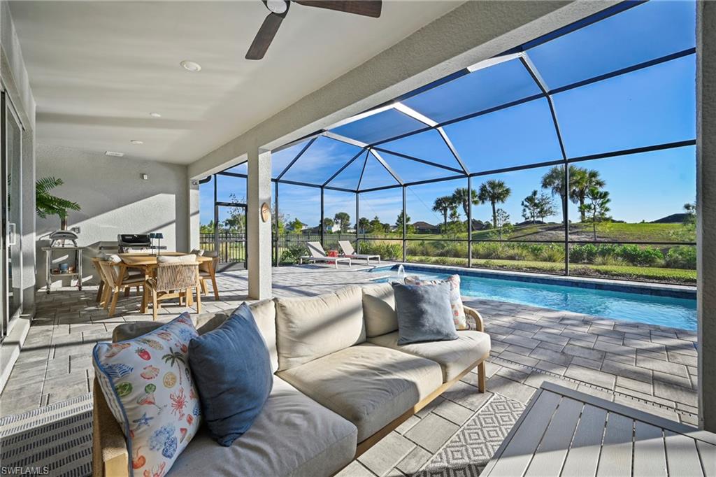 15764 Appalachian Drive Babcock Ranch, FL 33982 - Photo 13 of 46 a living room with furniture a rug and a table