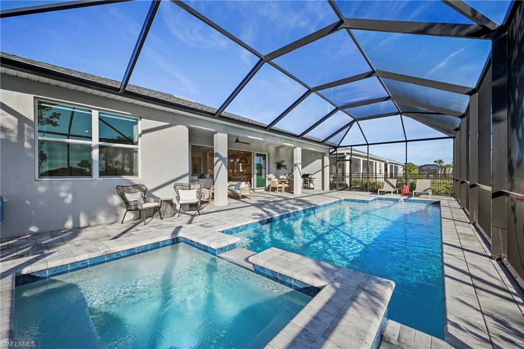 15764 Appalachian Drive Babcock Ranch, FL 33982 - Photo 15 of 46 a view of a swimming pool with a patio