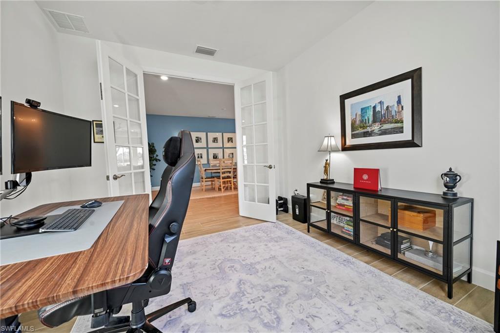 15764 Appalachian Drive Babcock Ranch, FL 33982 - Photo 30 of 46 a bedroom with furniture and a flat screen tv