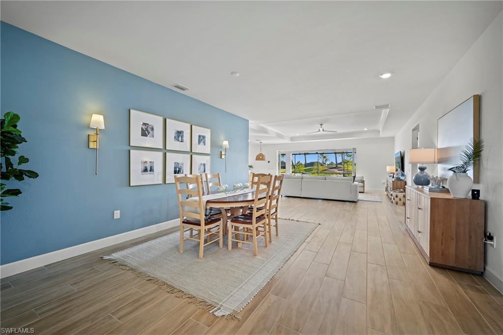 15764 Appalachian Drive Babcock Ranch, FL 33982 - Photo 3 of 46 a dining room with furniture and window