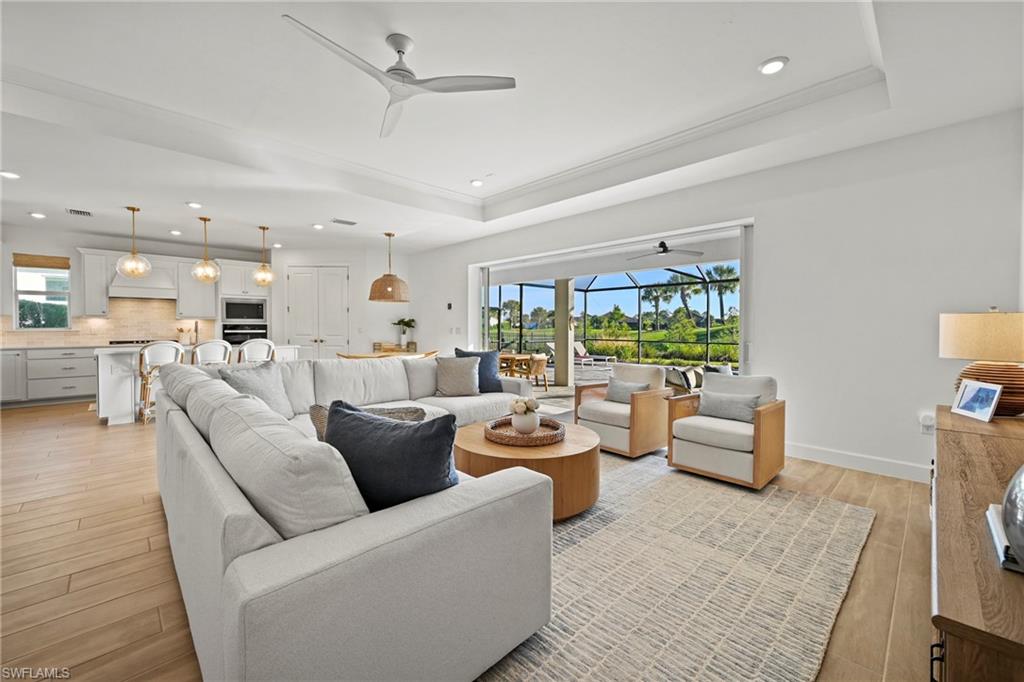 15764 Appalachian Drive Babcock Ranch, FL 33982 - Photo 4 of 46 a living room with furniture and a large window