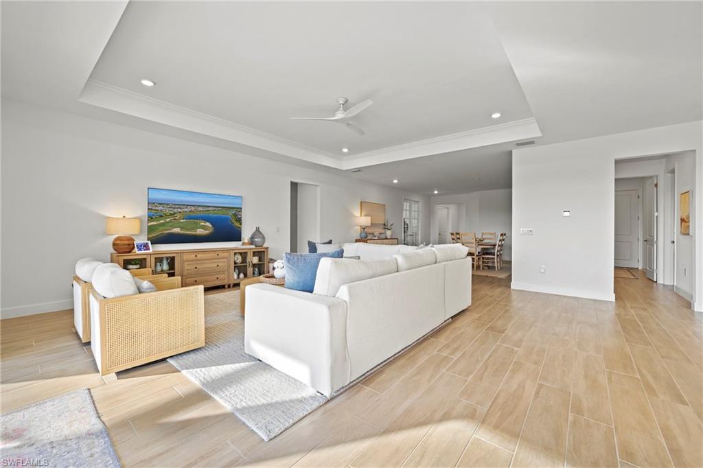 15764 Appalachian Drive Babcock Ranch, FL 33982 - Photo 6 of 46 a living room with furniture and a wooden floor