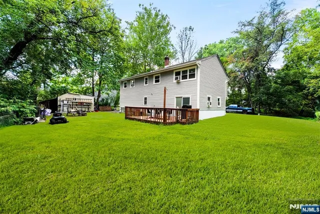 a view of a deck with a lake view