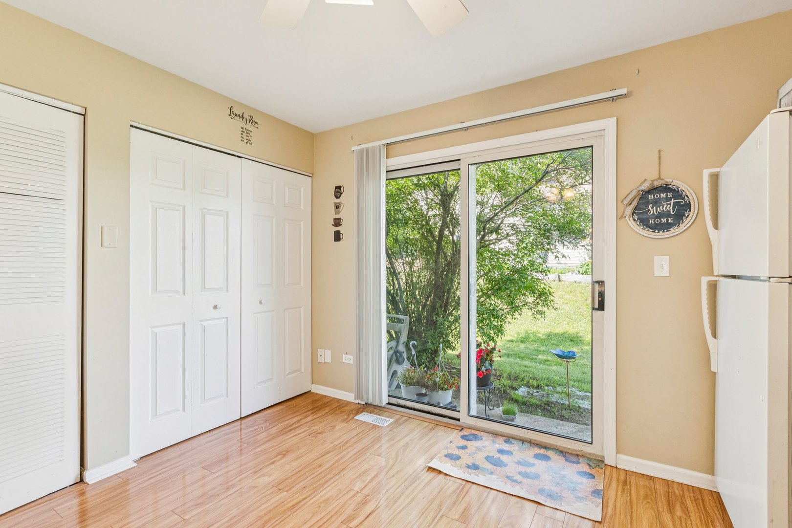 1192 Sumac Trail Hoffman Estates, IL 60192 - Photo 21 of 39 a view of an empty room with wooden floor and a window