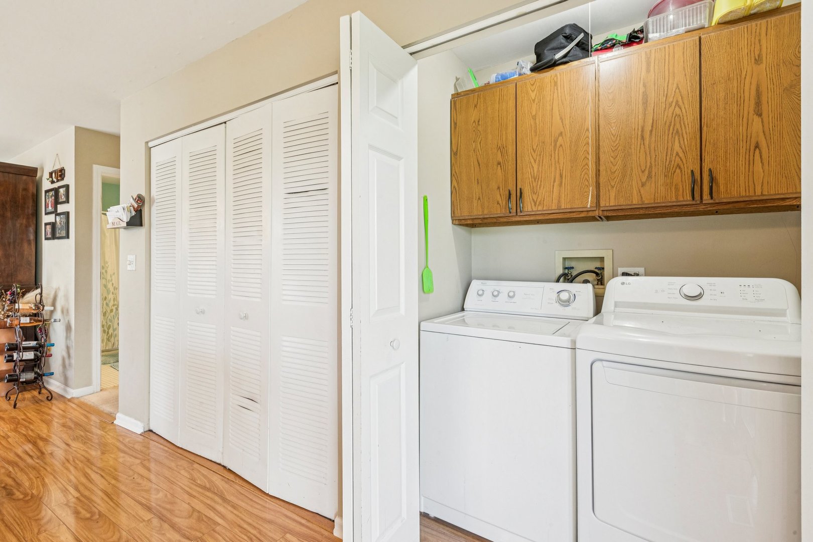 1192 Sumac Trail Hoffman Estates, IL 60192 - Photo 23 of 39 a utility room with dryer and washer