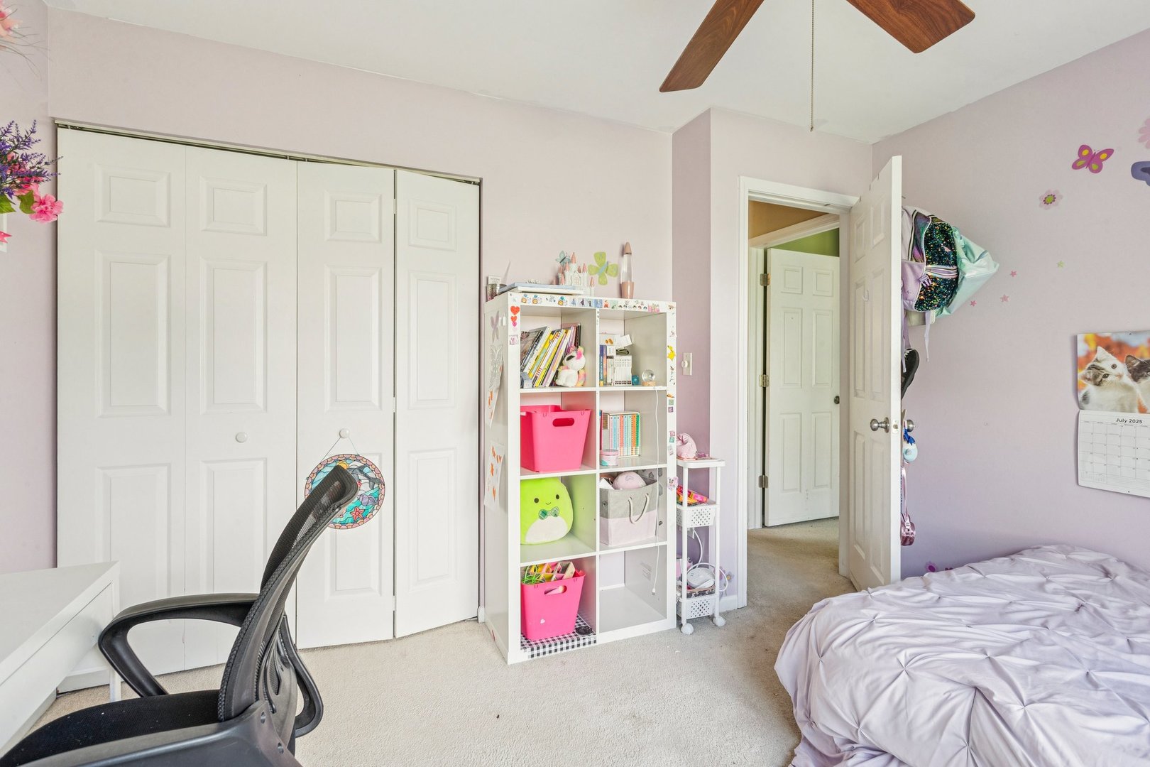 1192 Sumac Trail Hoffman Estates, IL 60192 - Photo 32 of 39 a bedroom with a bed a desk and chair