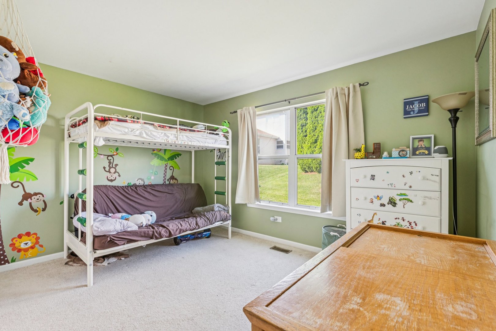 1192 Sumac Trail Hoffman Estates, IL 60192 - Photo 33 of 39 a bed room with a bed and a window