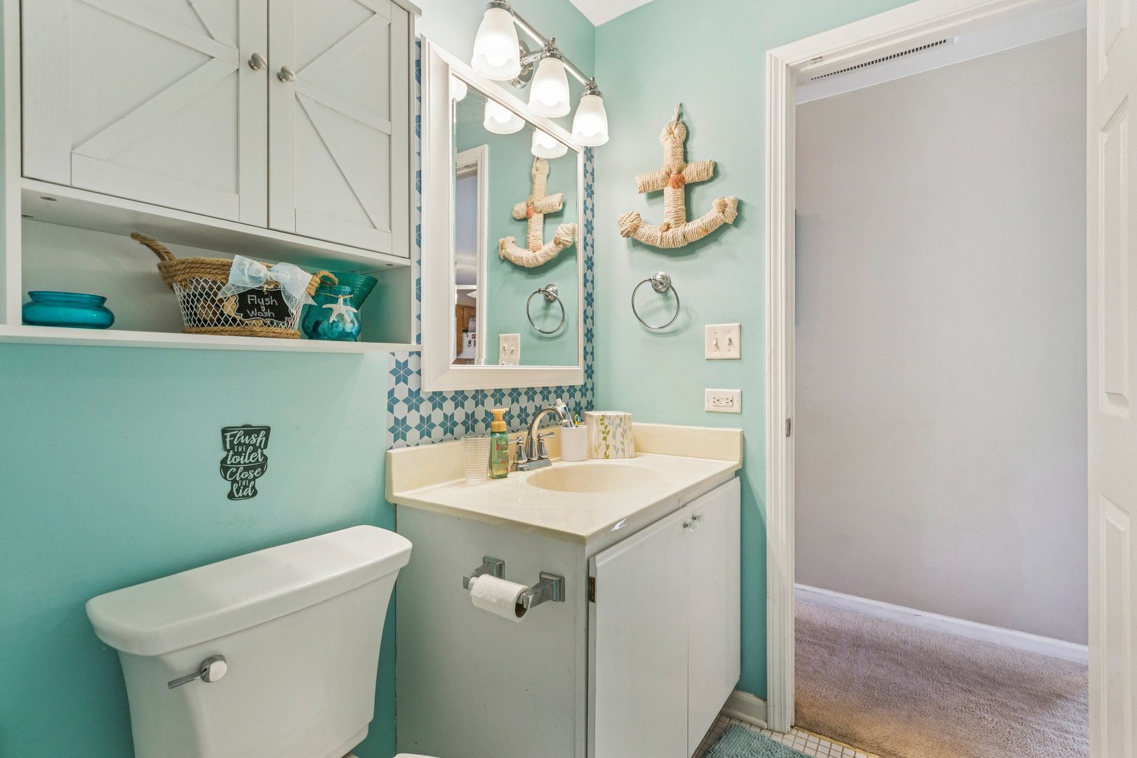 1192 Sumac Trail Hoffman Estates, IL 60192 - Photo 36 of 39 a bathroom with a sink mirror vanity and toilet