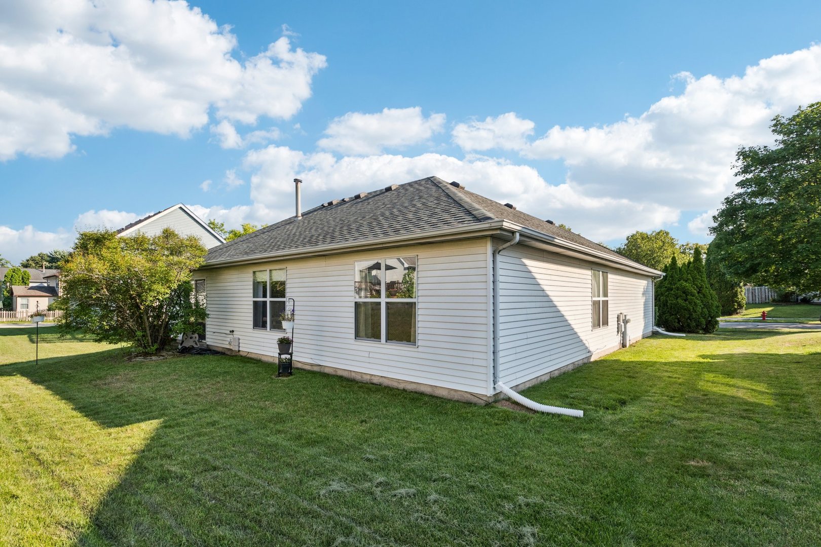 1192 Sumac Trail Hoffman Estates, IL 60192 - Photo 37 of 39 a view of a house with a yard