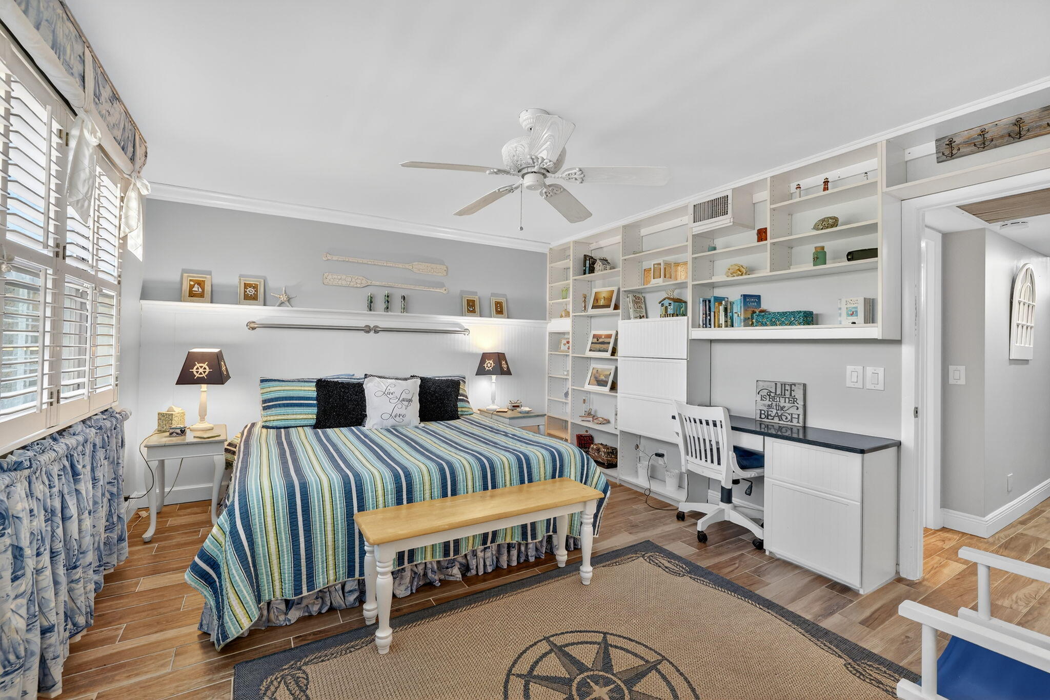 2355 Northeast Ocean Boulevard, Unit 17A Stuart, FL 34996 - Photo 15 of 30 a living room with furniture and a chandelier