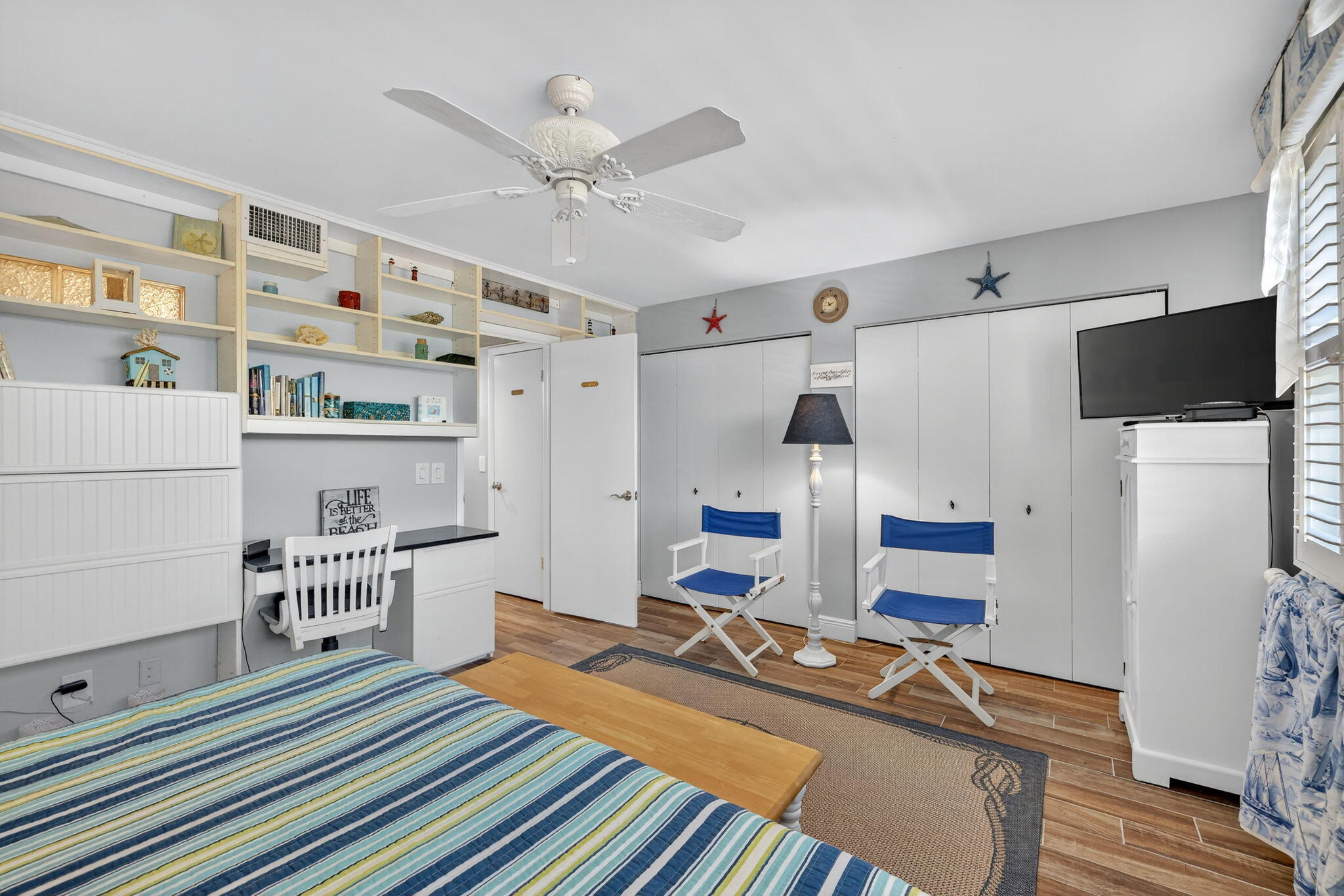 2355 Northeast Ocean Boulevard, Unit 17A Stuart, FL 34996 - Photo 17 of 30 a room with furniture and a chandelier