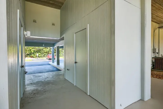 a view of hallway with natural light