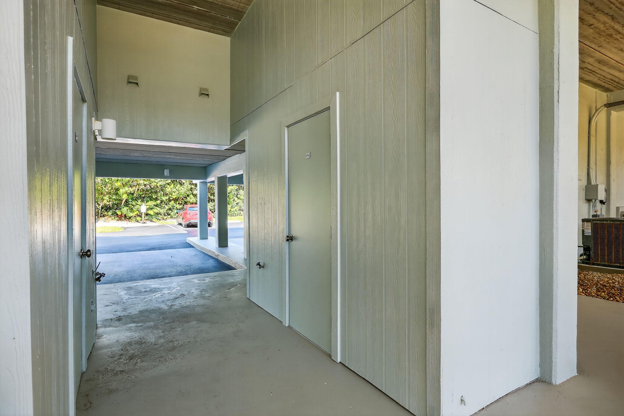 2355 Northeast Ocean Boulevard, Unit 17A Stuart, FL 34996 - Photo 21 of 30 a view of hallway with natural light