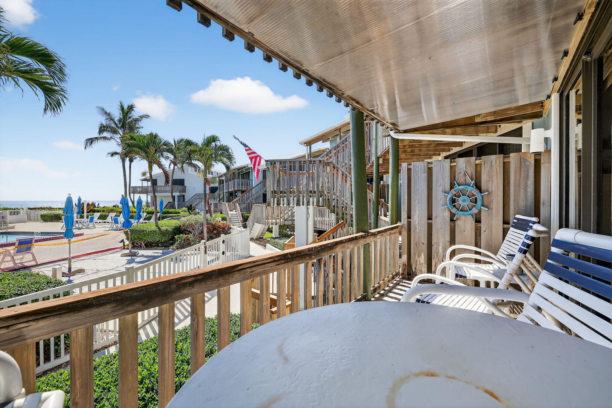 2355 Northeast Ocean Boulevard, Unit 17A Stuart, FL 34996 - Photo 6 of 30 a view of balcony with furniture