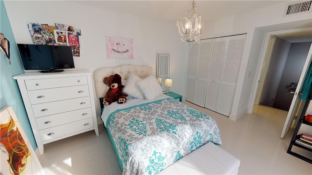 8241 Boca Rio Drive Boca Raton, FL 33433 - Photo 23 of 53 SECOND BEDROOM UPSTAIRS