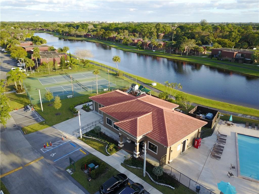 8241 Boca Rio Drive Boca Raton, FL 33433 - Photo 47 of 53 NEW CLUBHOUSE, POOL AND TENNIS COURTS