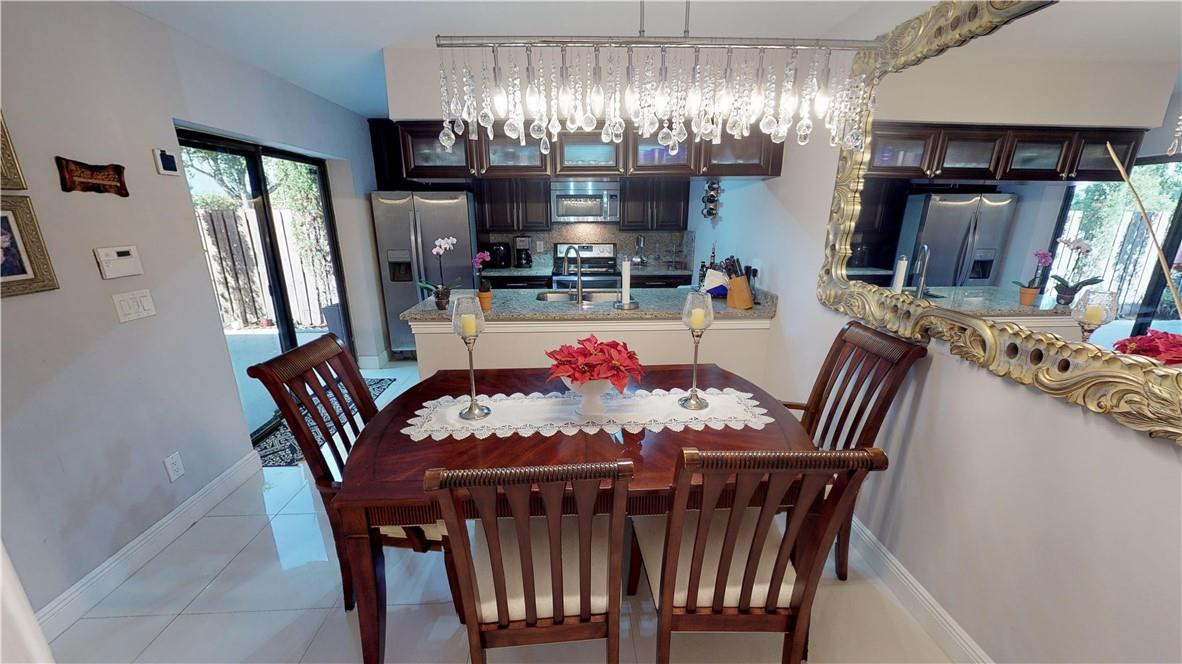 8241 Boca Rio Drive Boca Raton, FL 33433 - Photo 9 of 53 KITCHEN DINING