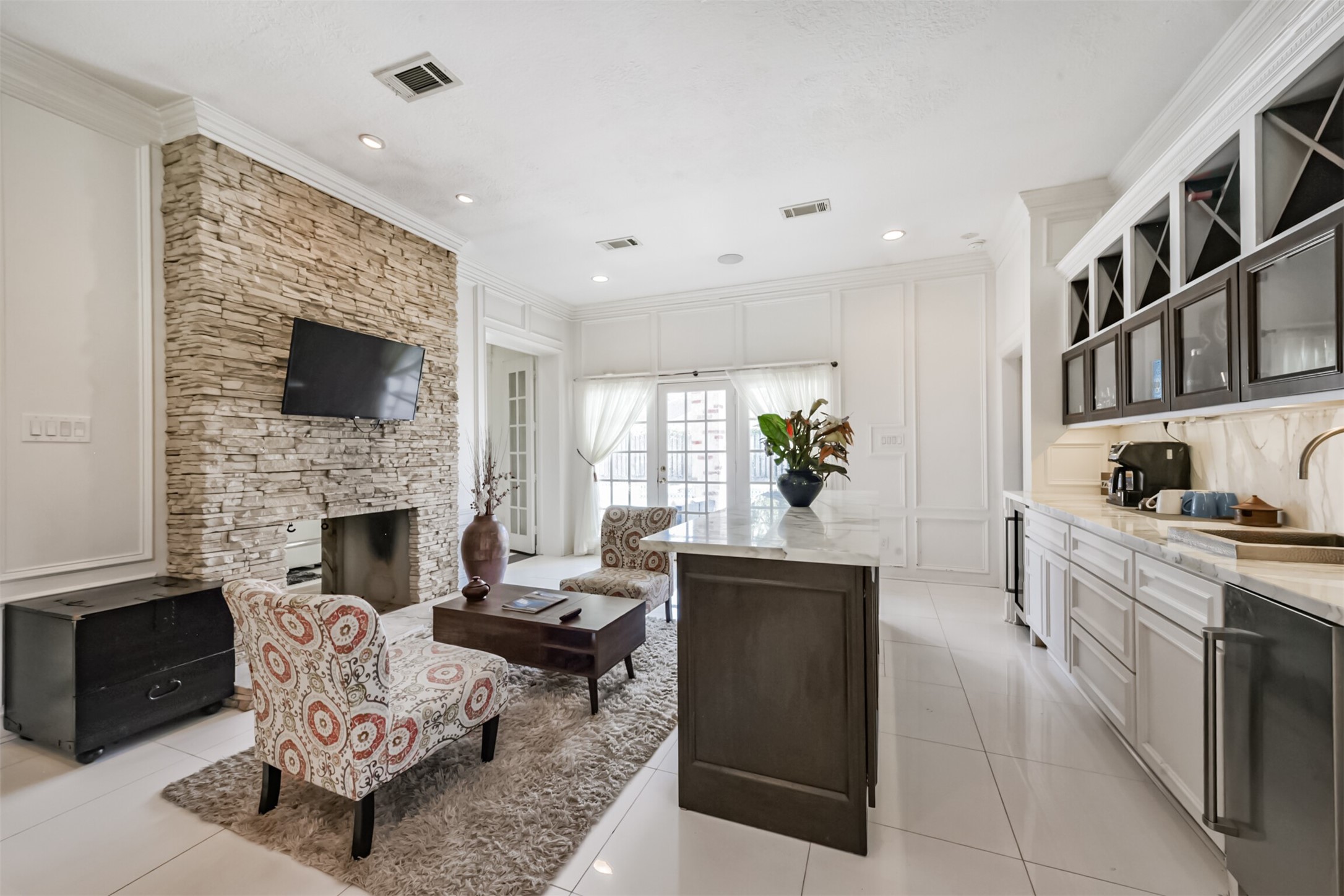 263 Wood Loop Street Houston, TX 77015 - Photo 14 of 48 a living room with furniture a fireplace and a flat screen tv