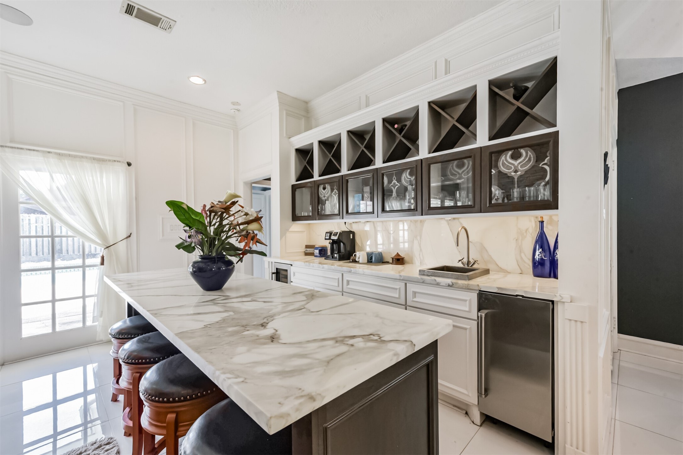 263 Wood Loop Street Houston, TX 77015 - Photo 16 of 48 a kitchen with a table and chairs in it